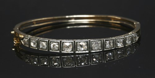 Lot 43 - A cased late Victorian diamond set bangle