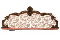 Lot 450 - A Victorian carved mahogany and upholstered head board