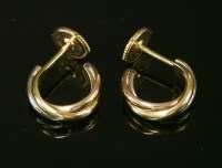 Lot 306 - A pair of 18ct gold Cartier 'Trinity' hoop earrings