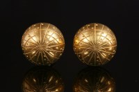 Lot 506 - A pair of Hermès gold-plated half dome zodiac clip-on earrings