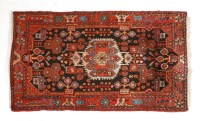 Lot 558 - A collection of three rugs