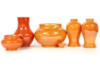 Lot 415 - Six Moorcroft orange lustre vases and a tea bowl