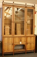 Lot 552 - An Arts and Crafts oak bookcase