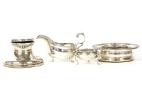 Lot 243 - A collection of silver items to include a wine coaster by Harrods Ltd (Richard Woodman Burbridge)