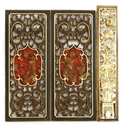 Lot 580 - A pair of Chinese wooden door panels