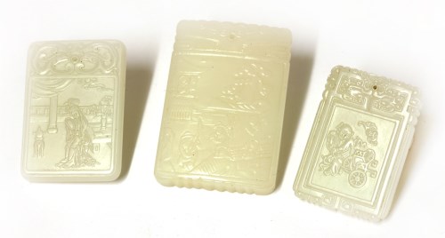 Lot 595 - Three Chinese white jade plaques