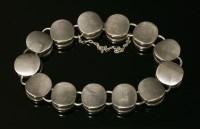 Lot 305 - A sterling silver bracelet by Georg Jensen