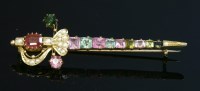 Lot 98 - A cased late Victorian gemstone and split pearl gold sword brooch