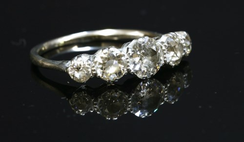 Lot 153 - A five stone diamond ring