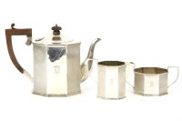 Lot 242 - A silver octagonal three piece tea set to