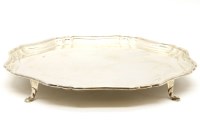 Lot 253 - A silver salver with pie crust rim