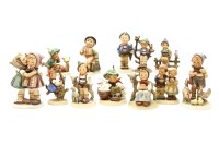 Lot 467 - A collection of twelve Goebel Hummel figures