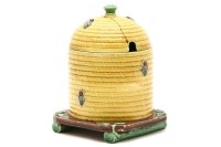 Lot 472 - A Minton majolica honey pot and cover