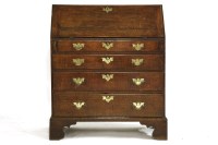 Lot 654 - A George III oak bureau