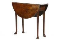 Lot 609 - A George II mahogany pad foot table