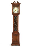 Lot 623 - An Old Charm oak longcase clock