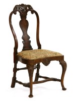 Lot 850 - An 18th century-style walnut side chair