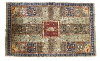 Lot 907 - A hand-knotted Turkish rug