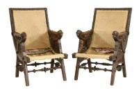 Lot 909 - A pair of unusual French walnut armchairs