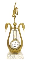 Lot 743 - A gilt metal lyre-form mantel clock