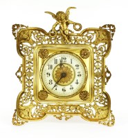 Lot 222 - A Continental gilt metal strut-form clock