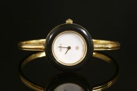 Lot 480 - A ladies' gold-plated Gucci quartz bangle watch