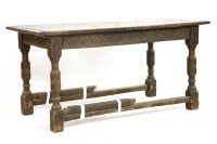 Lot 607 - A 17th century and later oak plank top table