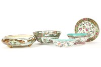 Lot 405 - A collection of three Canton famille rose bowls