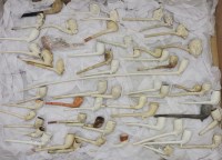 Lot 399A - A collection of approximately fifty five vintage clay pipes