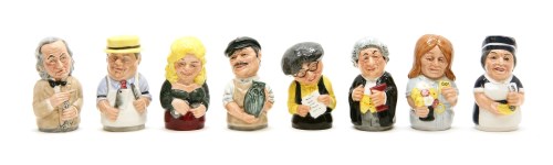 Lot 288 - A collection of Royal Doulton 'Doultonville' character candlesnuffers