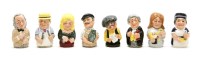 Lot 288A - A collection of Royal Doulton 'Doultonville' character candlesnuffers