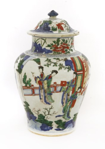 Lot 41 - A Chinese Transitional wucai jar and cover