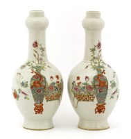 Lot 694 - A pair of Chinese famille rose vases