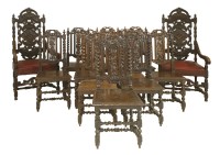 Lot 616 - Twelve Carolean style oak dining chairs