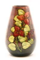 Lot 328 - A Walter Moorcroft Flambé 'Bougainvillea' pattern vase