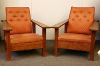 Lot 657 - A pair of oak Arts and Crafts steamer chairs