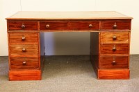 Lot 559 - An early 20th century mahogany partners desk