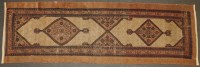 Lot 658 - A hand knotted Caucasian runner