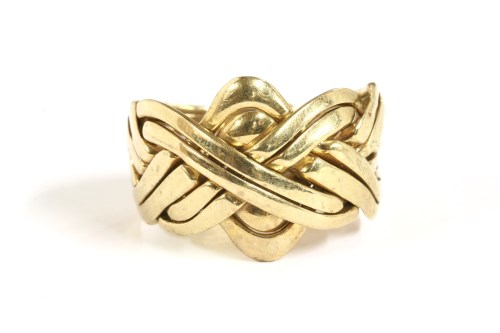 Lot 74 - A gentlemen's 9ct gold eight row puzzle ring