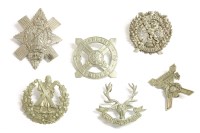 Lot 151 - Six regimental badges