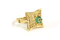 Lot 81 - A high carat gold synthetic emerald cluster ring