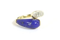 Lot 80 - A gold diamond and Lapis Lazuli crossover ring