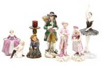 Lot 445 - A collection of decorative ceramic figures