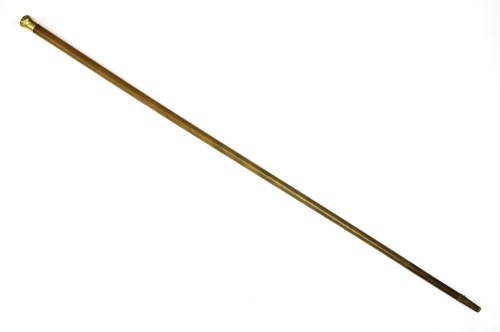 Lot 335 - A gold-mounted rhinoceros horn walking stick