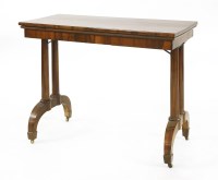 Lot 561 - A 19th century fold-over card table