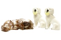 Lot 476 - A pair of 19th century Staffordshire poodle figures