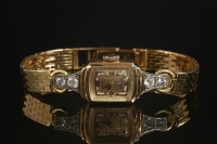 Lot 490 - A ladies' gold Crown mechanical bracelet watch
