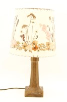 Lot 458 - An Arts and Crafts oak table lamp