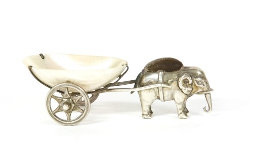 Lot 70 - An Edwardian hallmarked silver elephant and cart pin cushion