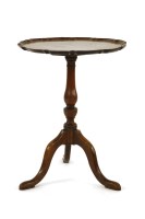 Lot 600 - A George III tripod table